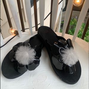 Black Ugg’s slippers with real lamb fur